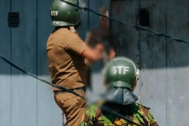 මීගමුව බන්ධනාගාර ගැටුමේදී වෙඩි තැබූ නිලධාරියාට තාවකාලික ස්ථාන මාරුවක්